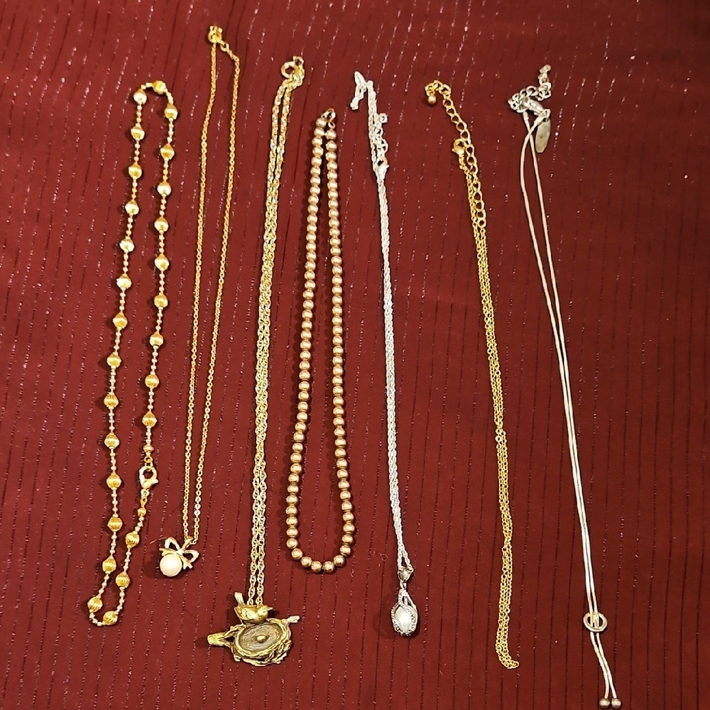 7 Assorted Gold And Silver Necklaces - image 1